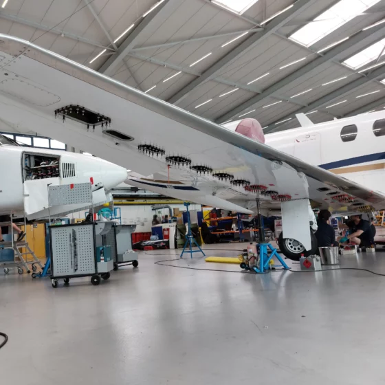 Fuel tank retainer installed with additional rivets on a Cessna Citation CJ2
