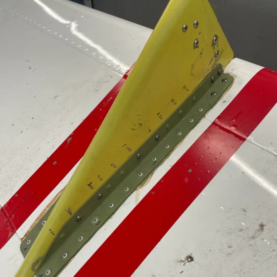 Replacement flap fairing installed in primer on a Cessna Citation CJ3 wing