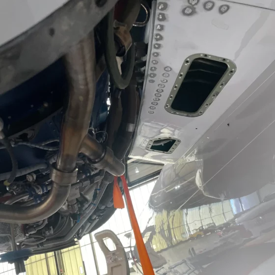 Replacement rivets set in the lower pylon skin of a Citation XLS+
