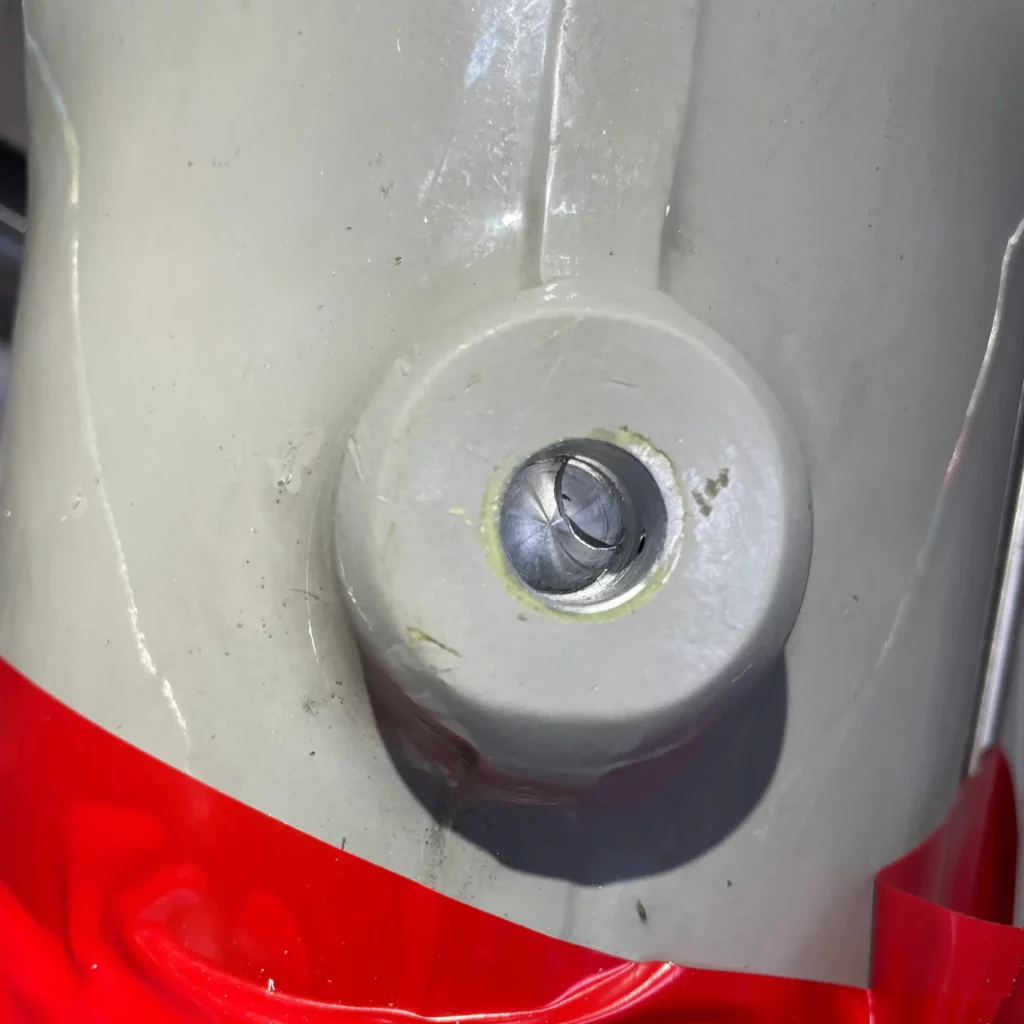 Finished bore in the main landing gear door attachment lug, ready for the larger bushing
